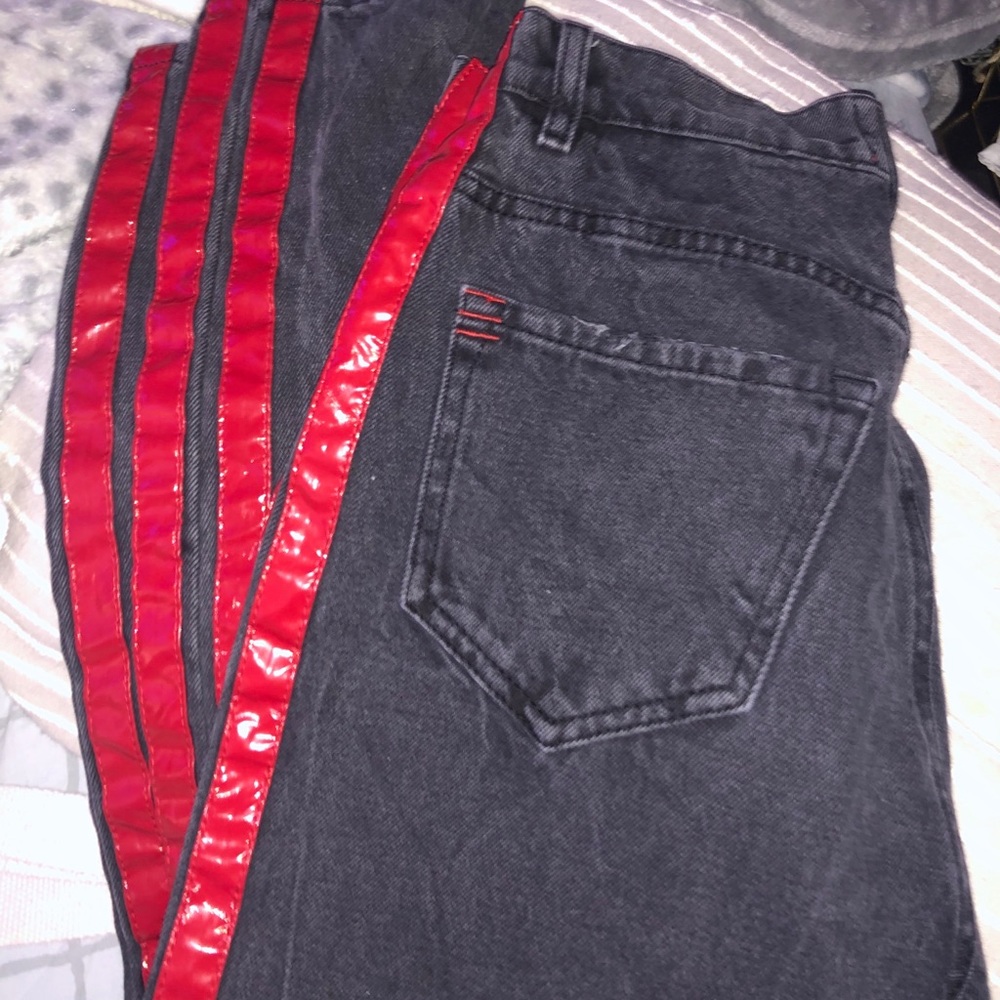 Washed black and red jeans